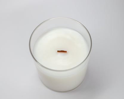 Top view of a Fioca candle showcasing its smooth soy and coconut wax blend with a natural wooden wick, emphasizing simplicity and purity